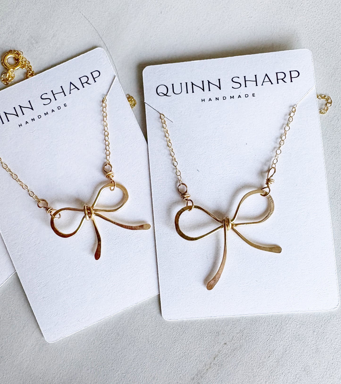 Gold Bow Necklace by Quinn Sharp